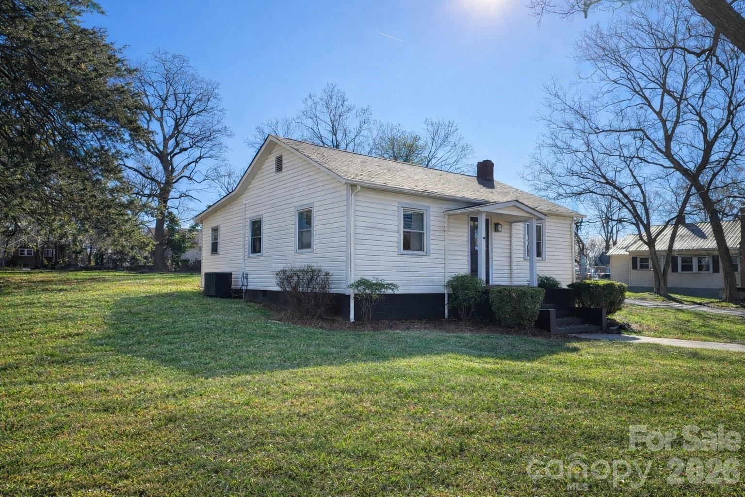 116 Barnes Lane Stony Point, NC 28678 - Photo 2 of 24 a front view of house with yard and green space
