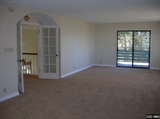 2085 Del Rio Lane Reno, NV 89509 - Photo 4 of 9 an empty room with windows