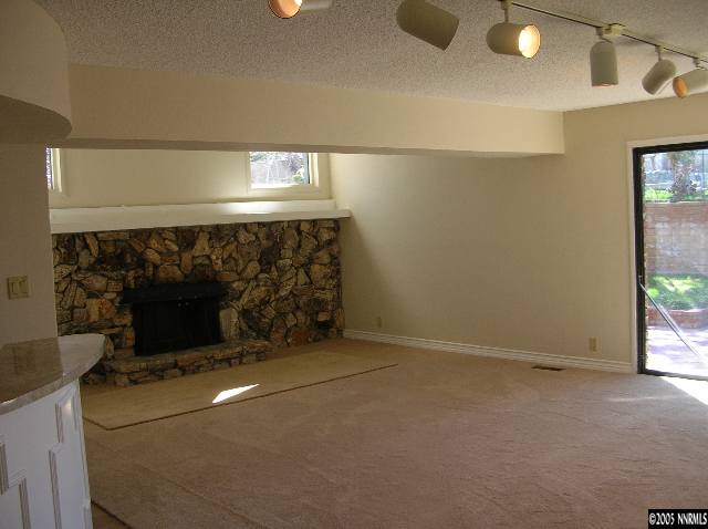 2085 Del Rio Lane Reno, NV 89509 - Photo 7 of 9 a room with a fireplace