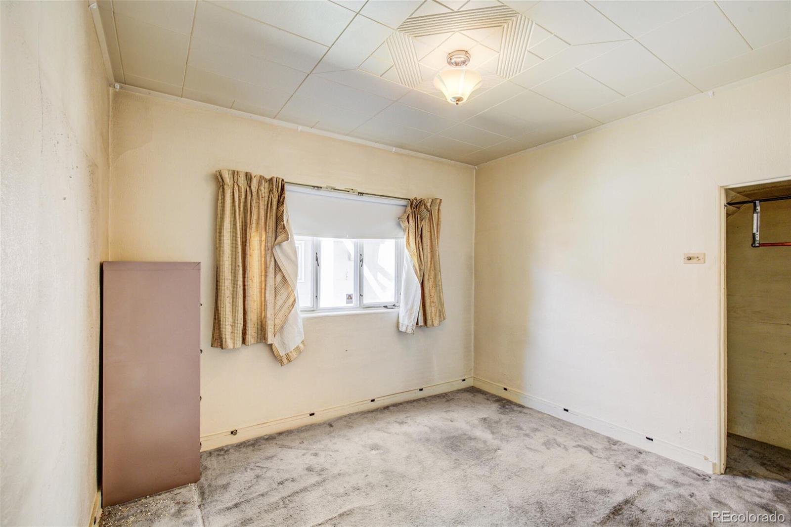 4515 Stuart Street Denver, CO 80212 - Photo 13 of 28 a view of entryway with wooden floor