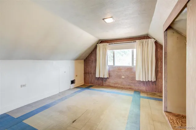 a view of a room with an empty space