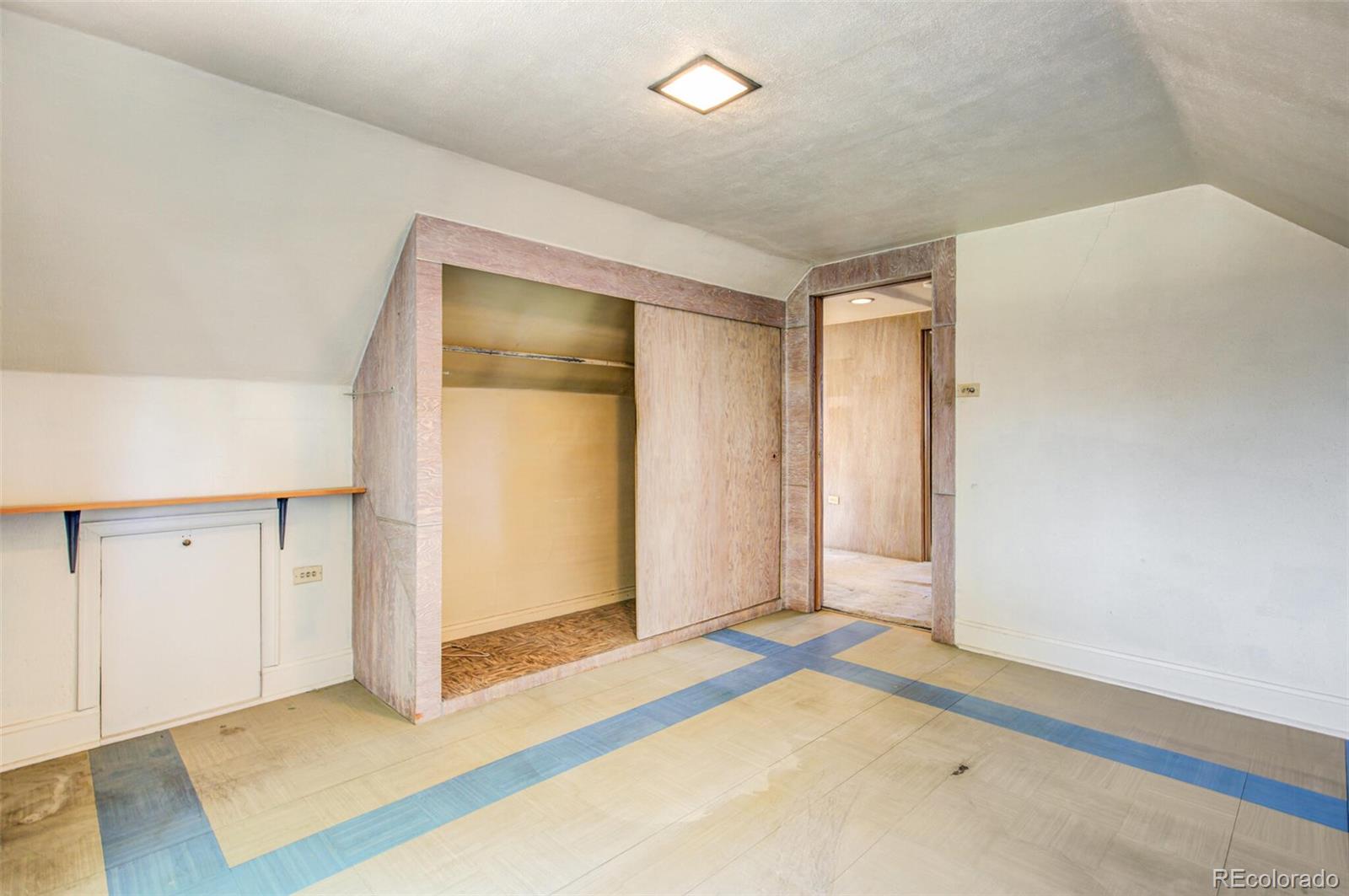 4515 Stuart Street Denver, CO 80212 - Photo 20 of 28 a view of a room with an empty space