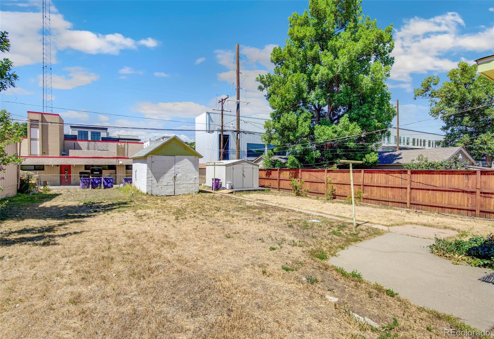 4515 Stuart Street Denver, CO 80212 - Photo 22 of 28 a view of yard and swimming pool