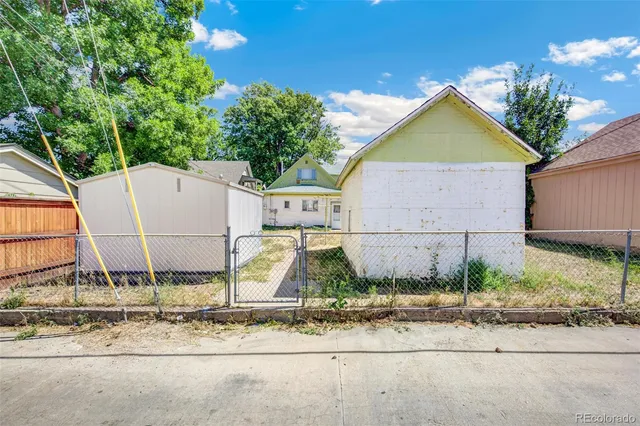 a view of house with yard and entertaining space