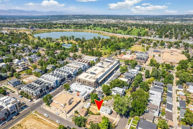 an aerial view of residential building and lake view