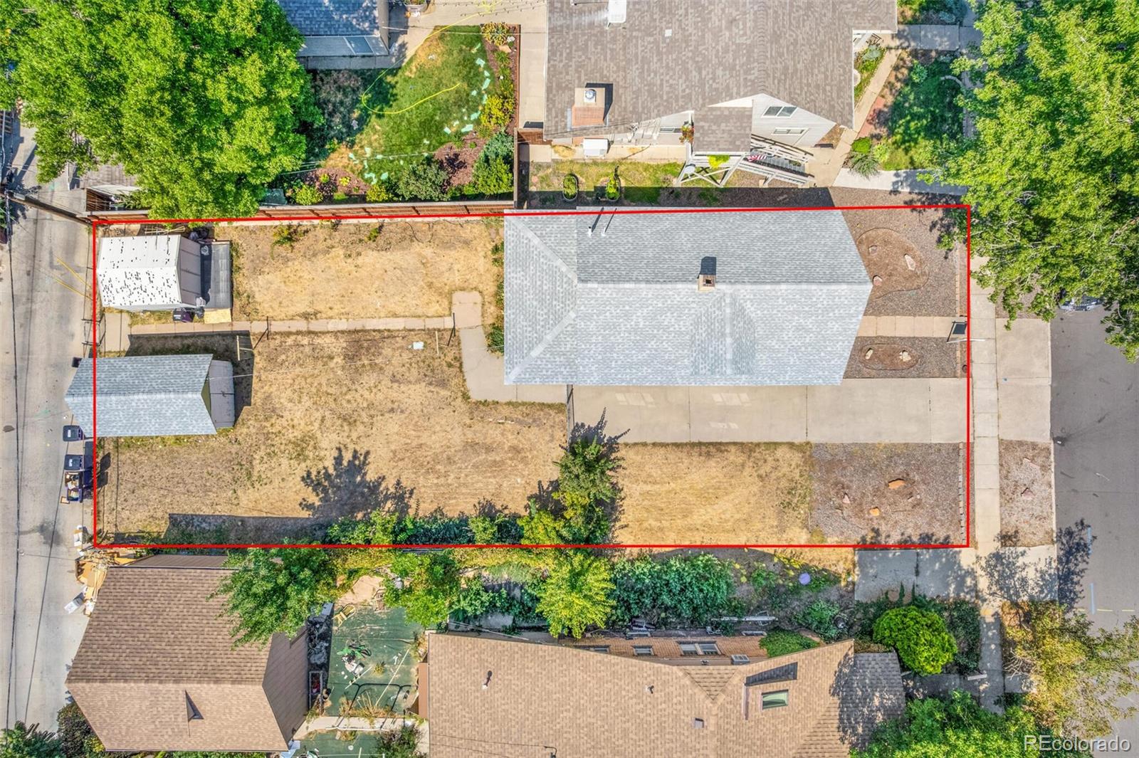 4515 Stuart Street Denver, CO 80212 - Photo 7 of 28 an aerial view of a house with a yard and garden