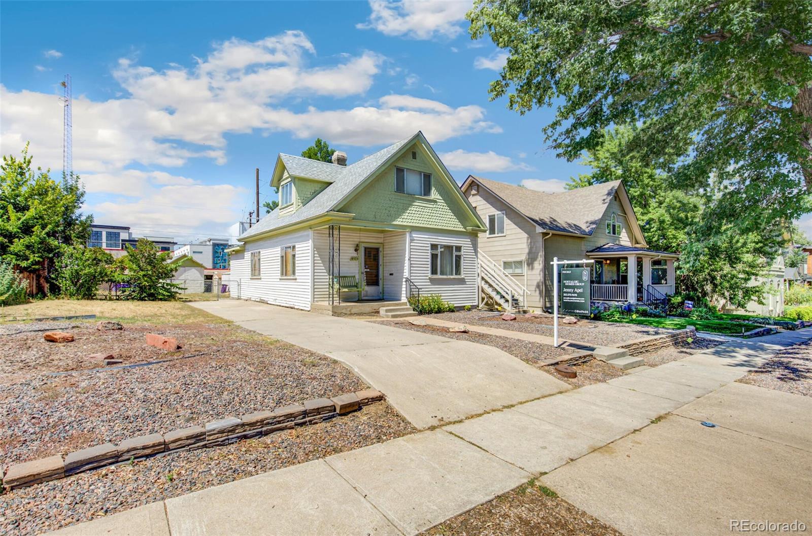 4515 Stuart Street Denver, CO 80212 - Photo 8 of 28 a front view of a house with yard