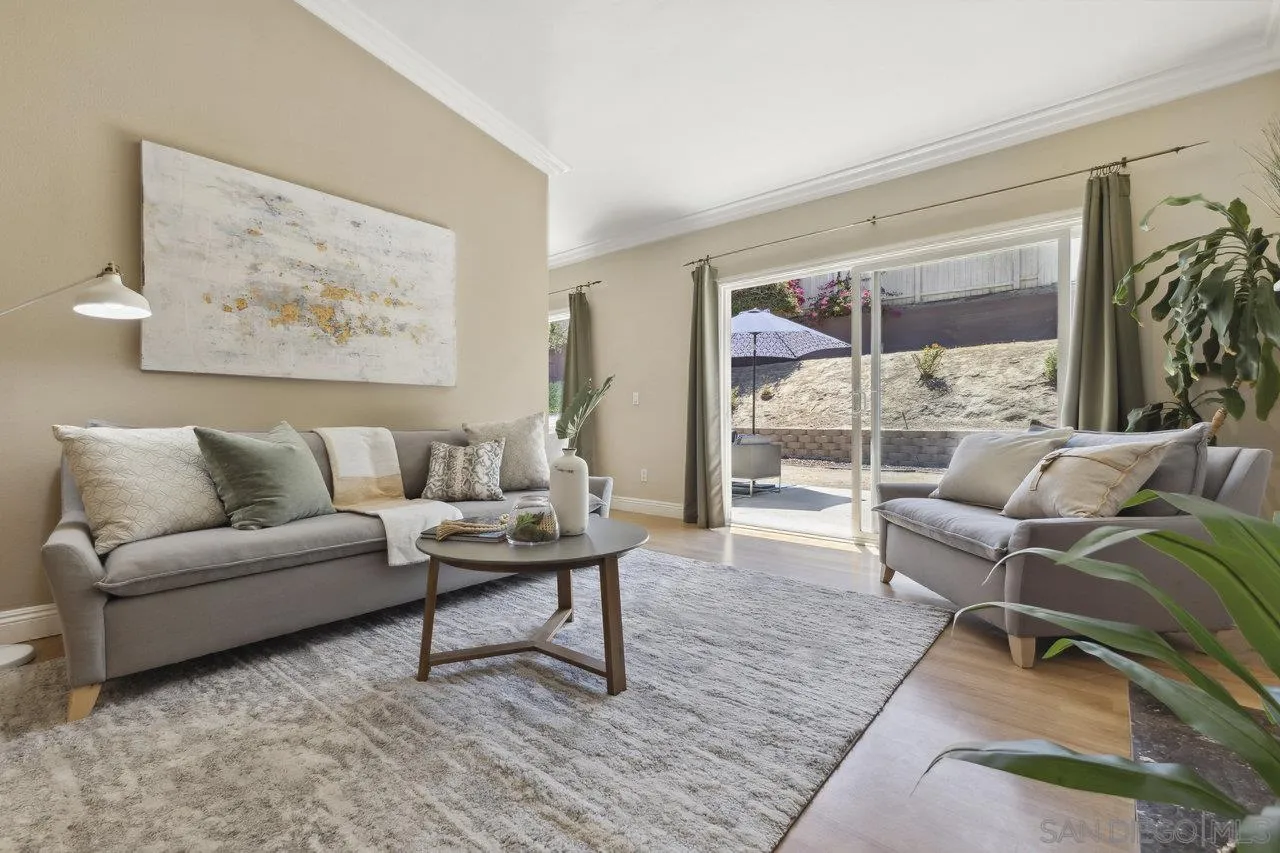 304 Avenida De Los Claveles Encinitas, CA 92024 - Photo 11 of 27 a living room with furniture and a large window