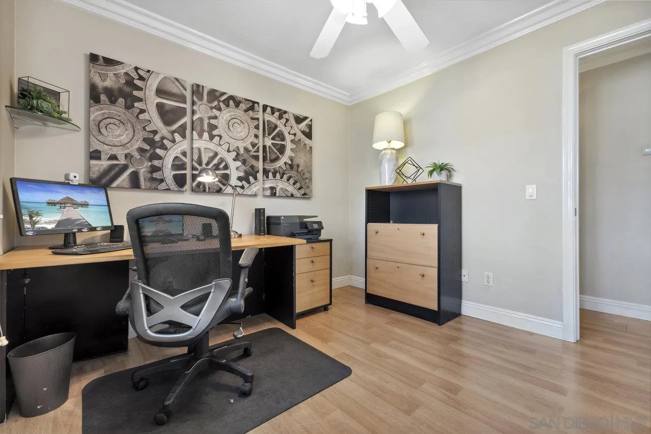 304 Avenida De Los Claveles Encinitas, CA 92024 - Photo 13 of 27 a view of workspace with wooden floor windows