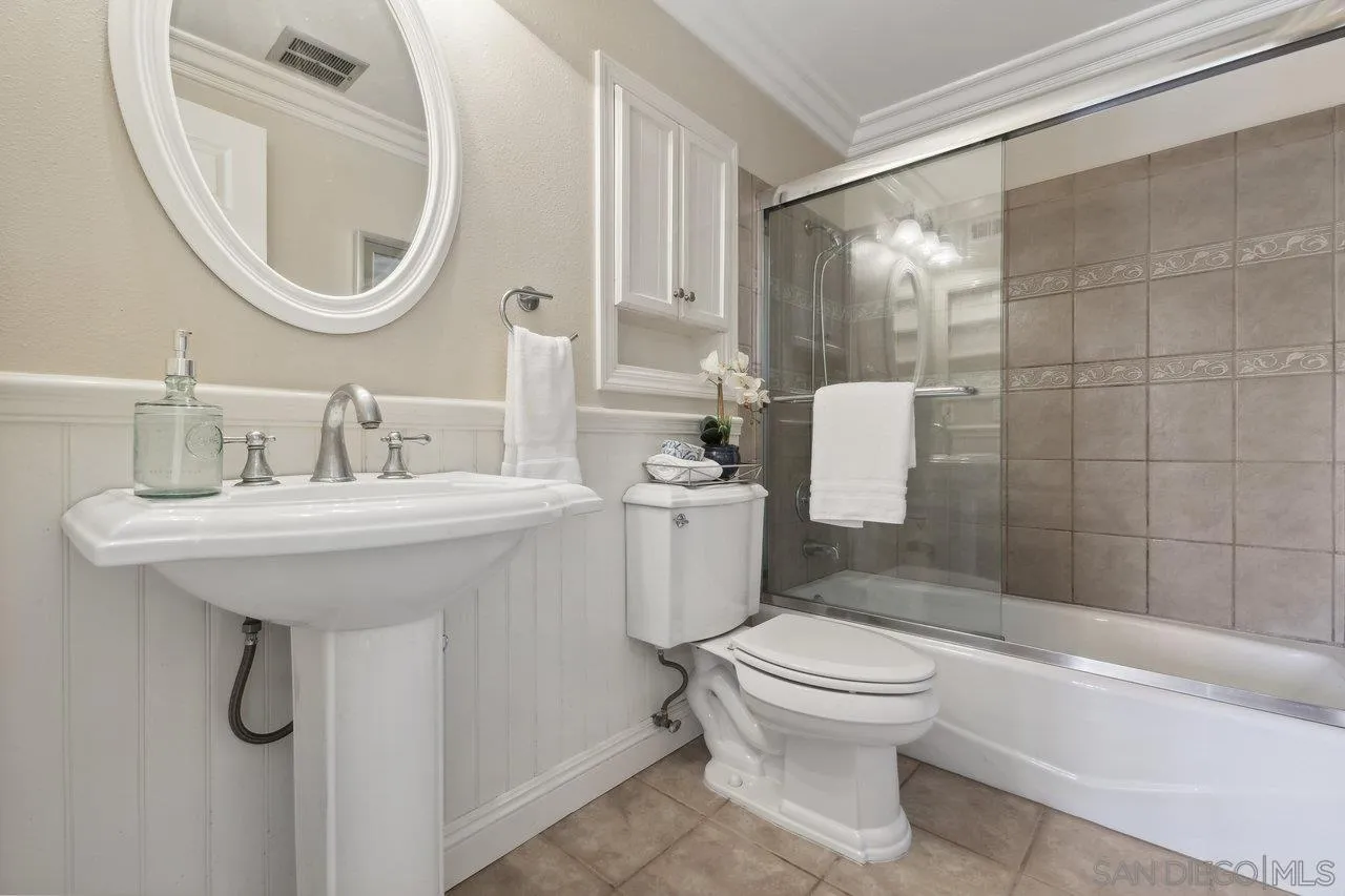 304 Avenida De Los Claveles Encinitas, CA 92024 - Photo 19 of 27 a bathroom with a sink toilet and shower