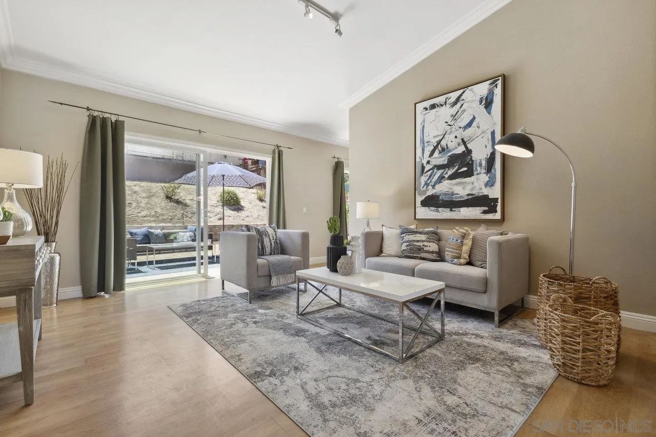 304 Avenida De Los Claveles Encinitas, CA 92024 - Photo 2 of 27 a living room with furniture and a large window