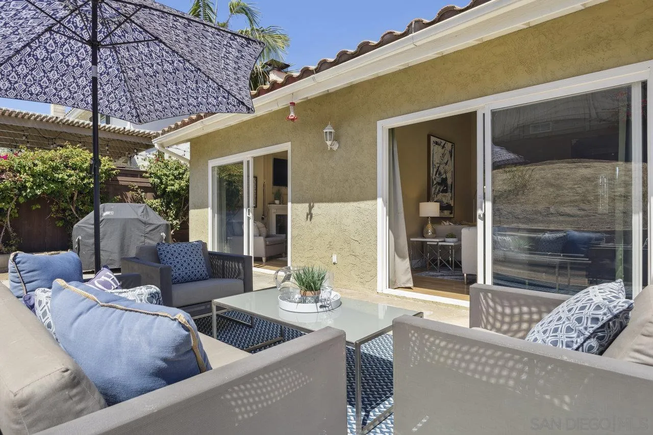 304 Avenida De Los Claveles Encinitas, CA 92024 - Photo 22 of 27 a outdoor living space with furniture and a potted plant