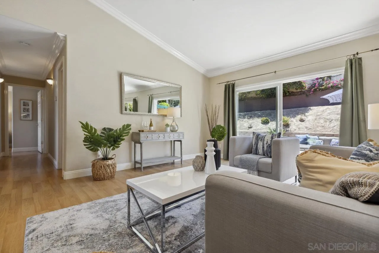 304 Avenida De Los Claveles Encinitas, CA 92024 - Photo 3 of 27 a living room with furniture and a large window