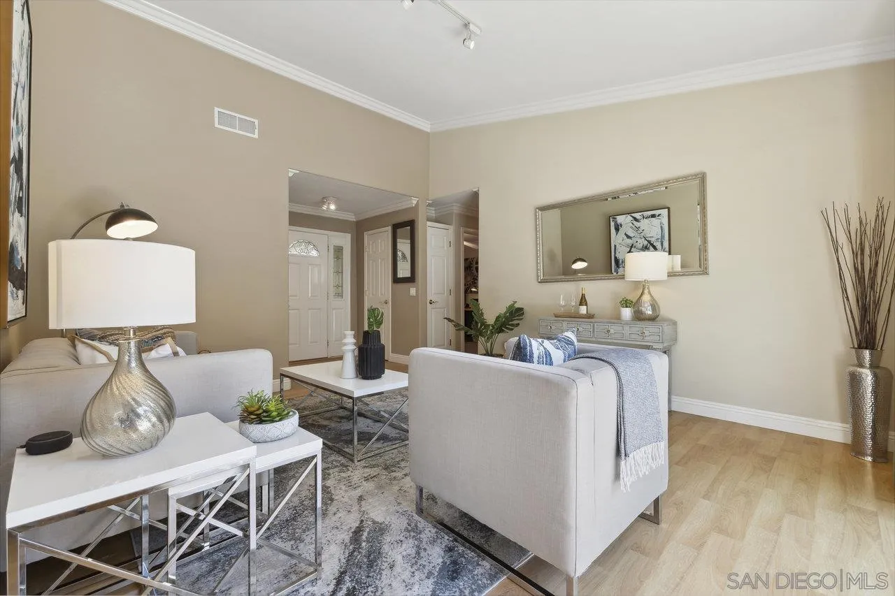 304 Avenida De Los Claveles Encinitas, CA 92024 - Photo 4 of 27 a living room with furniture and a lamp