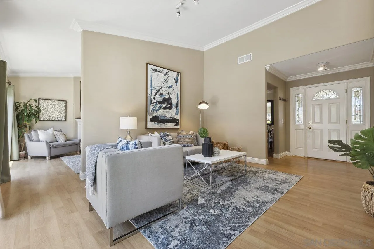 304 Avenida De Los Claveles Encinitas, CA 92024 - Photo 5 of 27 a living room with furniture and wooden floor