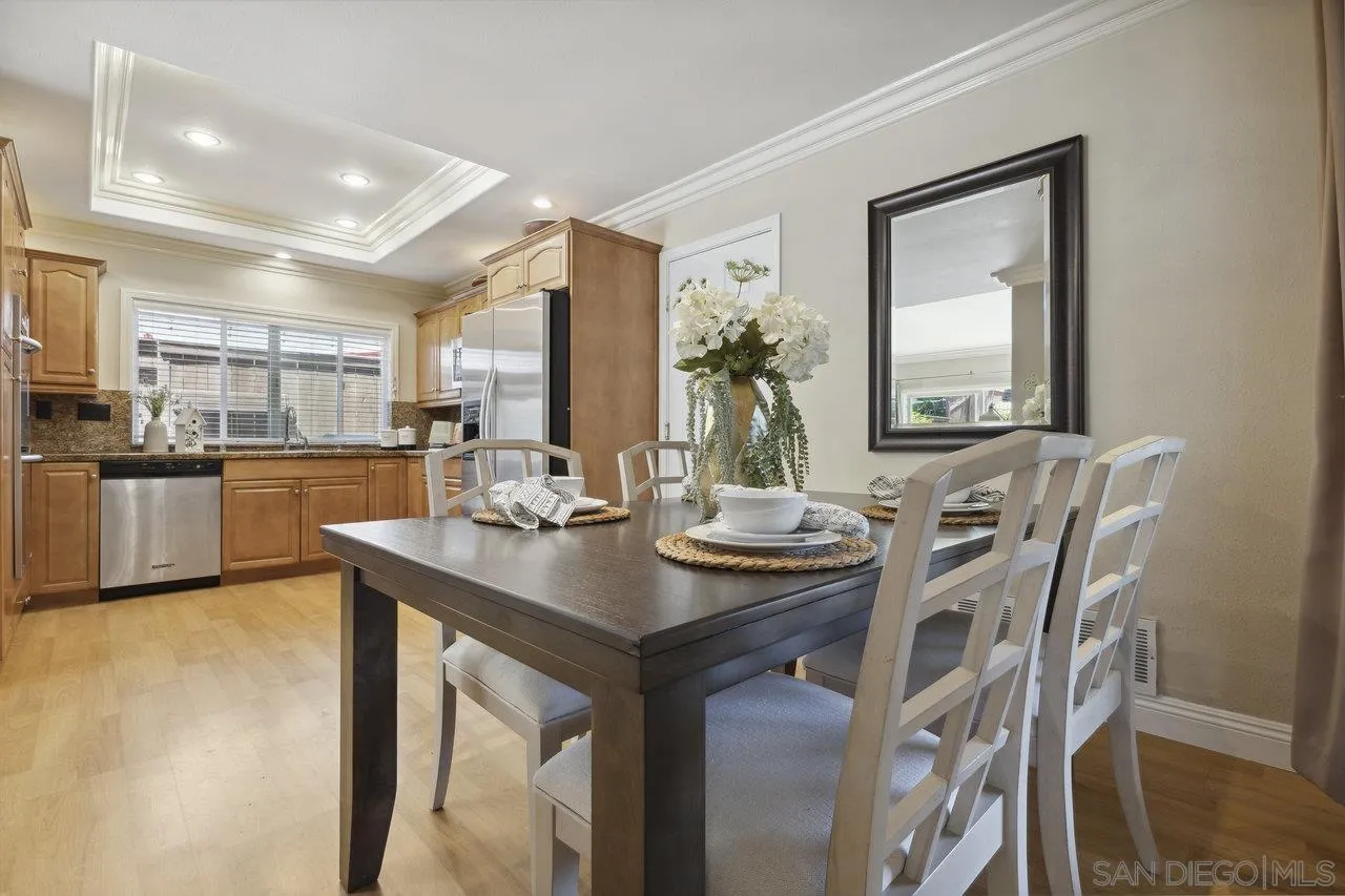 304 Avenida De Los Claveles Encinitas, CA 92024 - Photo 6 of 27 a kitchen with a table and chairs in it