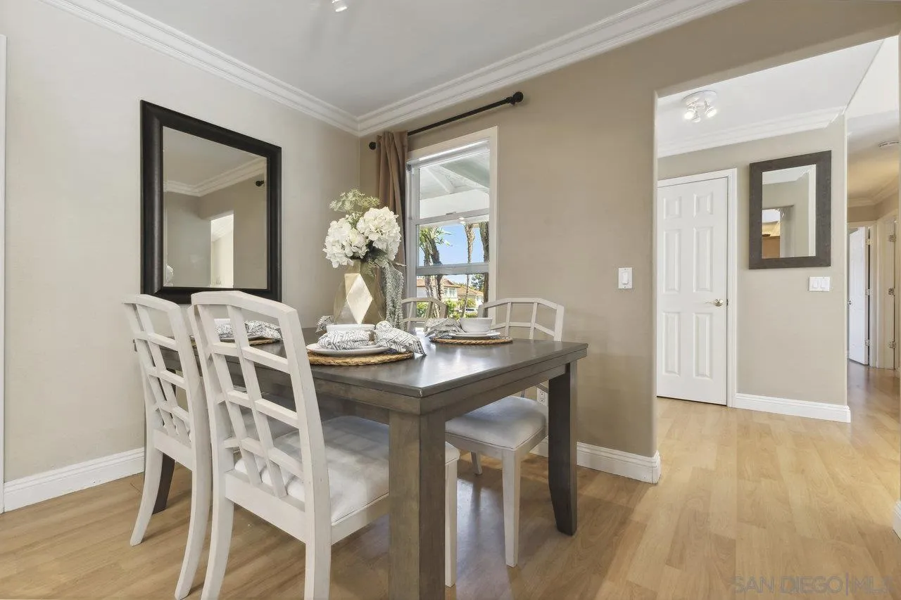 304 Avenida De Los Claveles Encinitas, CA 92024 - Photo 8 of 27 a view of a dining room with furniture and wooden floor