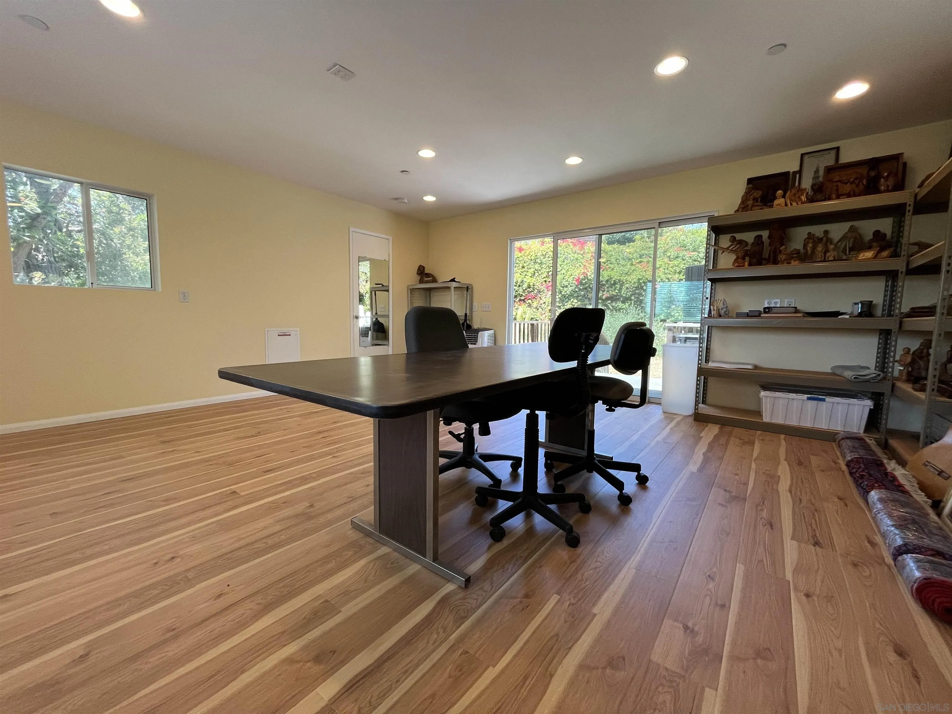 4688 Sun Valley Road Del Mar, CA 92014 - Photo 14 of 40 a view of a workspace with furniture and wooden floor