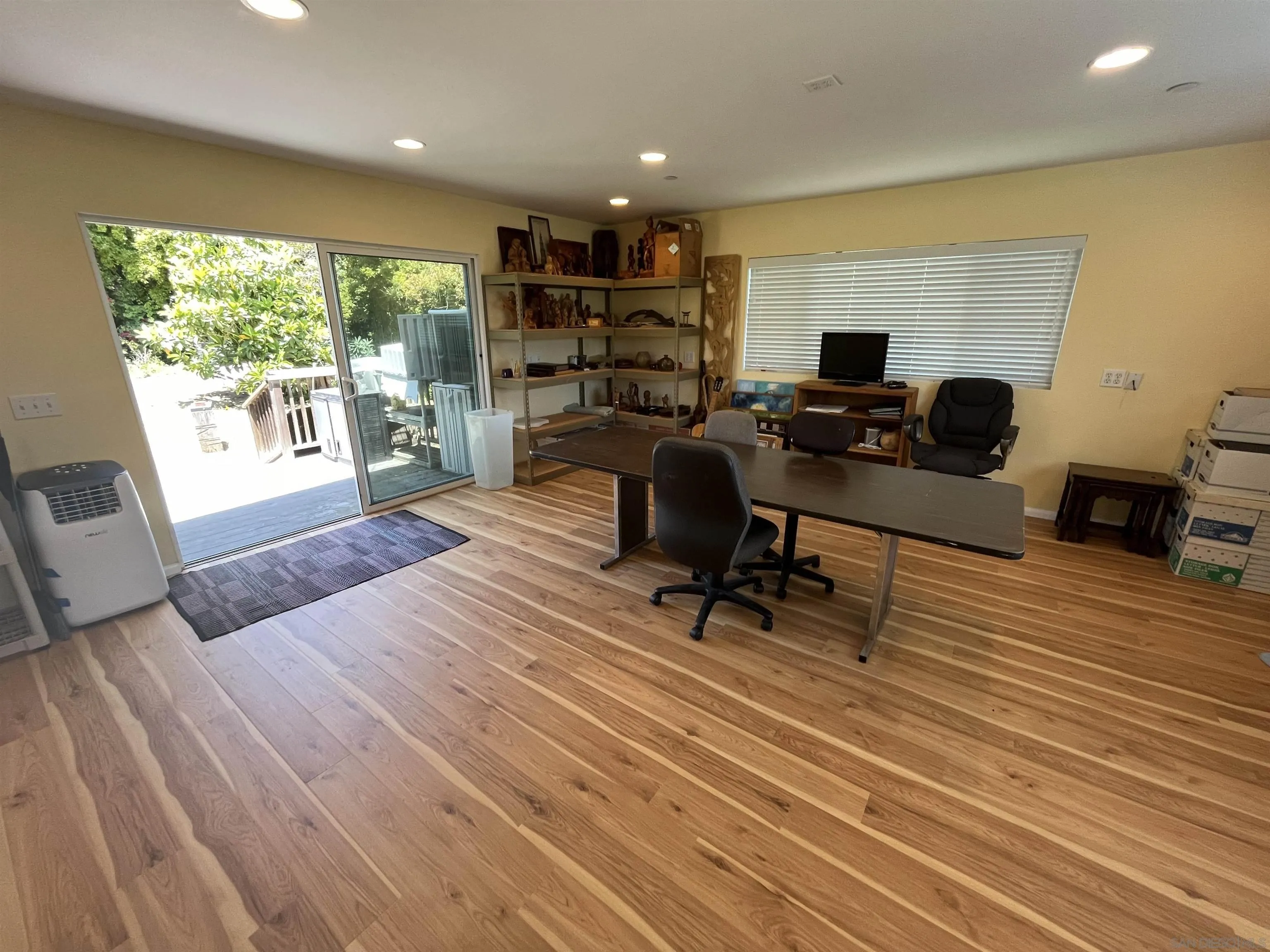 4688 Sun Valley Road Del Mar, CA 92014 - Photo 15 of 40 a view of a workspace with furniture and a window
