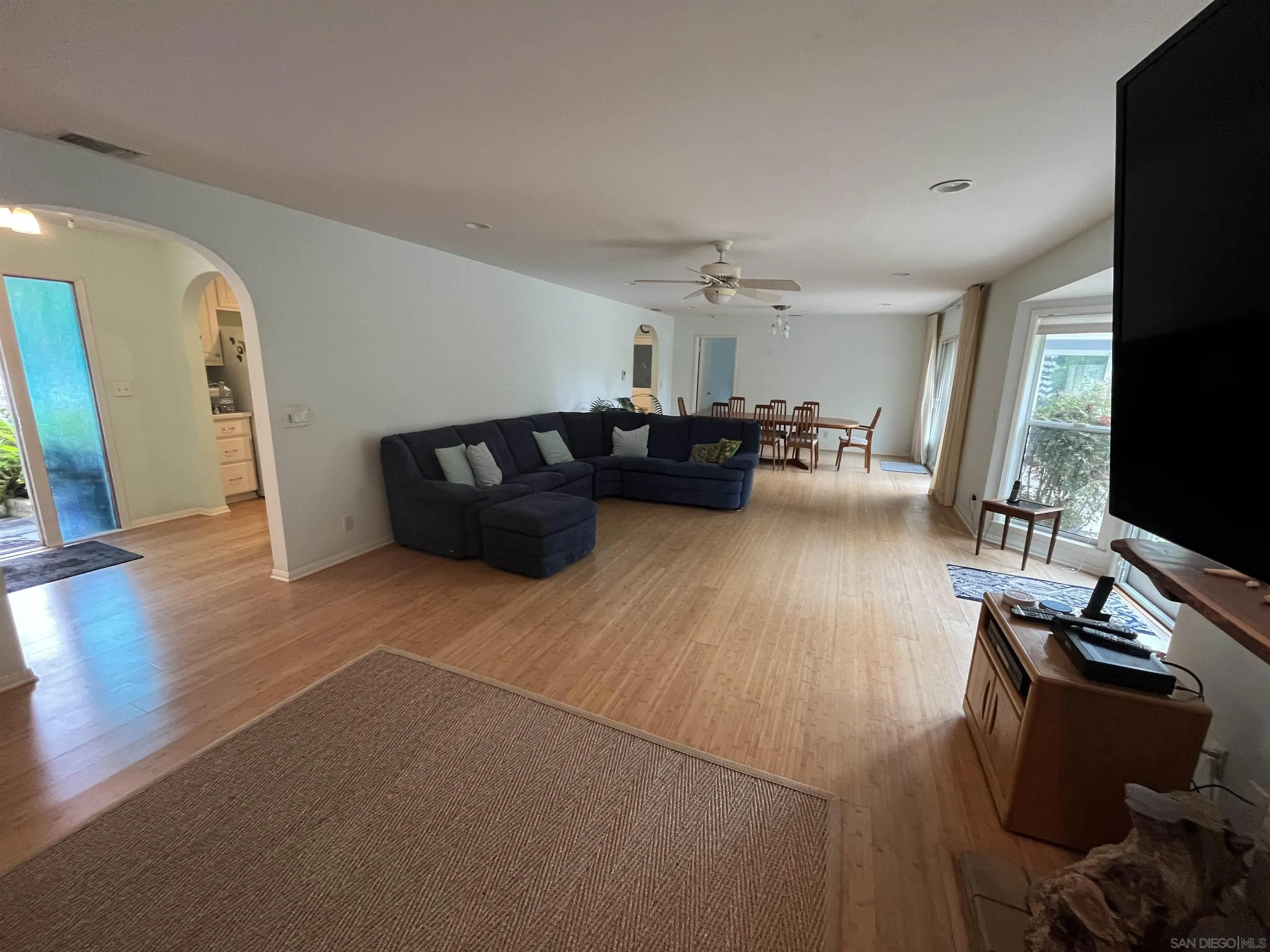 4688 Sun Valley Road Del Mar, CA 92014 - Photo 6 of 40 a living room with furniture and a flat screen tv