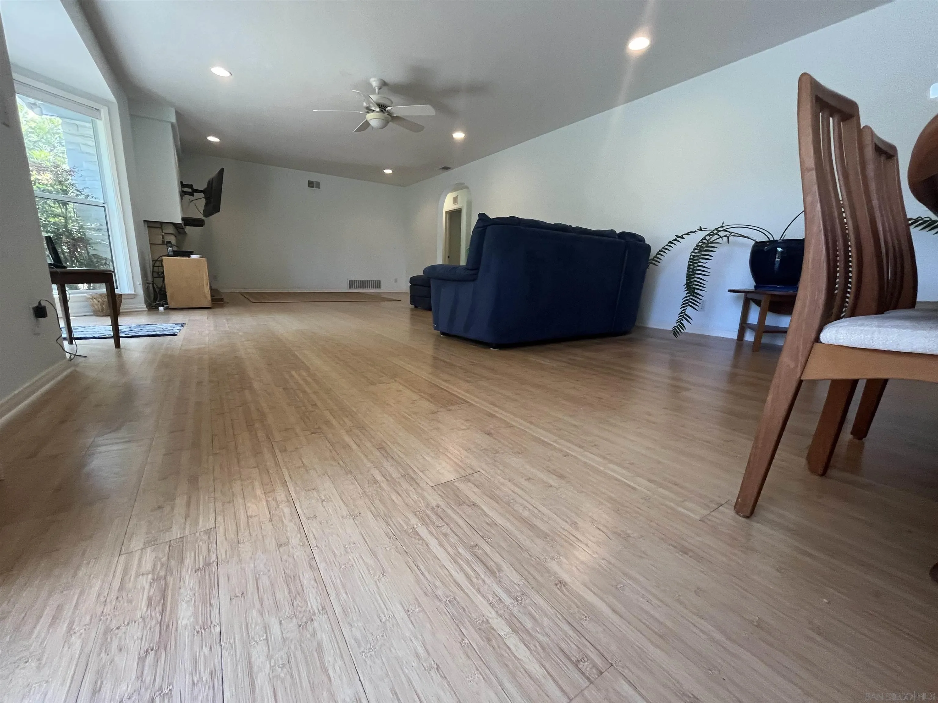 4688 Sun Valley Road Del Mar, CA 92014 - Photo 7 of 40 a living room with furniture and a wooden floor