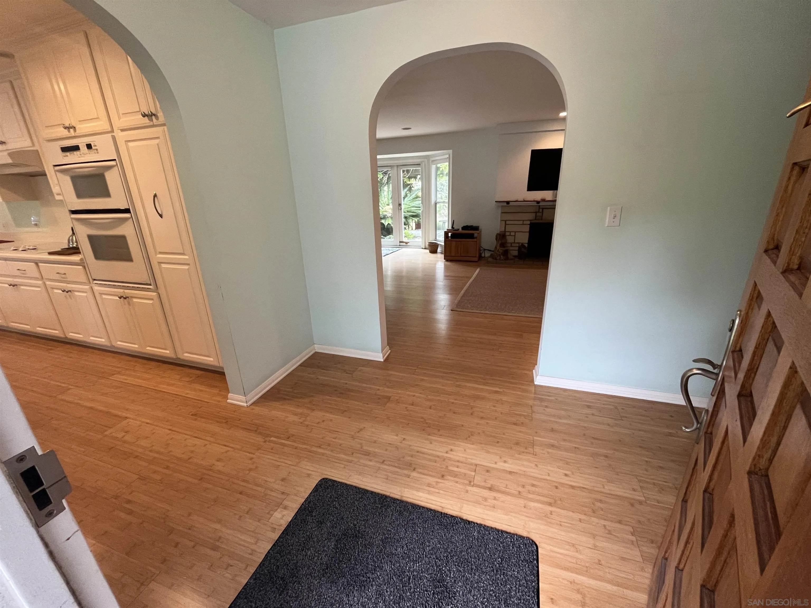 4688 Sun Valley Road Del Mar, CA 92014 - Photo 8 of 40 an entryway with wooden floor and livingroom view