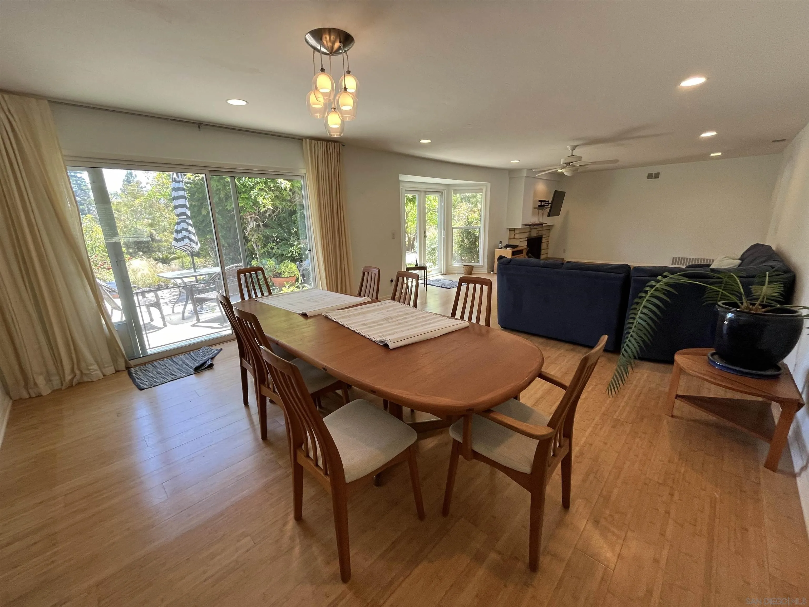 4688 Sun Valley Road Del Mar, CA 92014 - Photo 9 of 40 a view of a dining room with furniture window and wooden floor