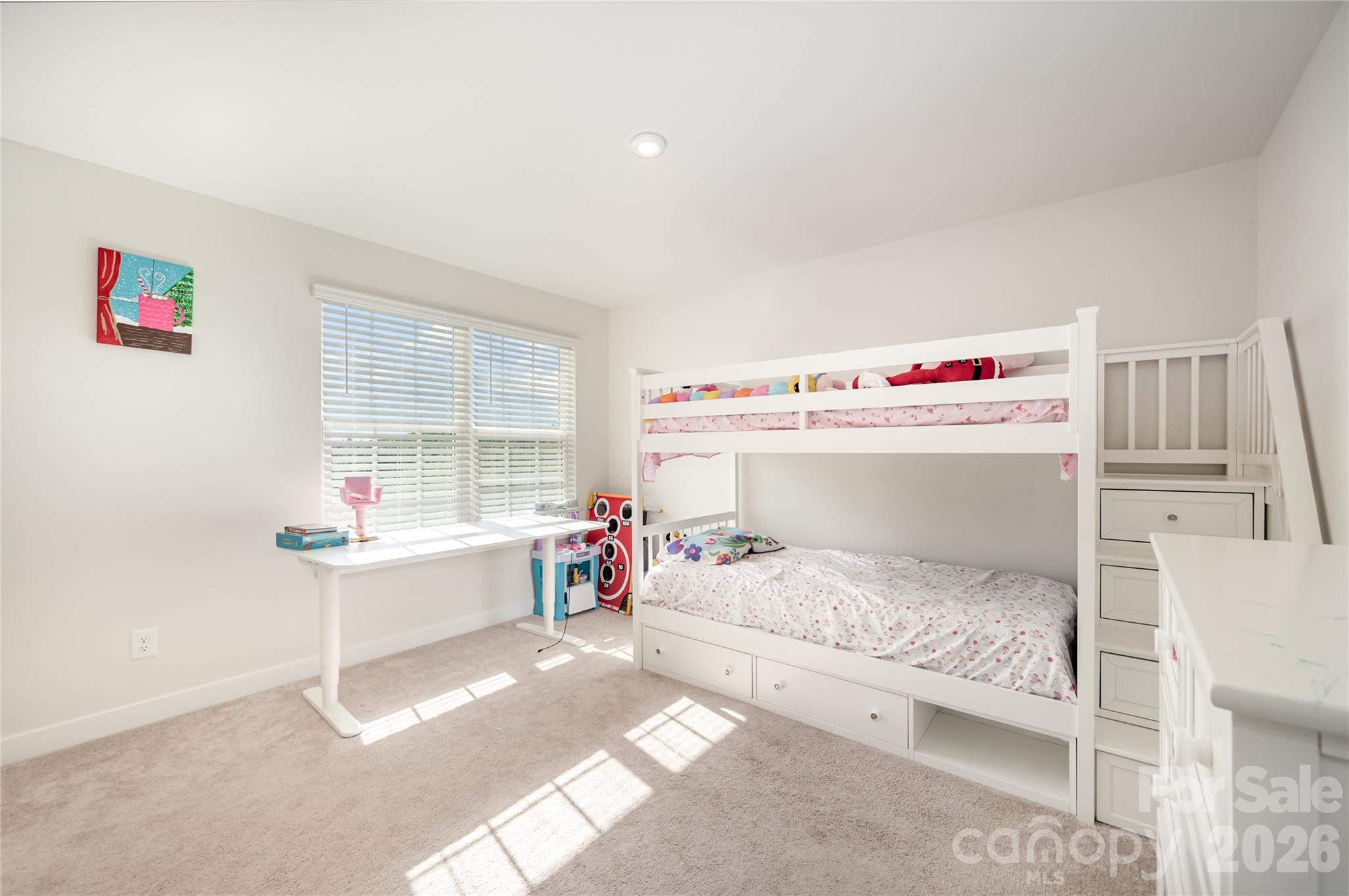 7222 Waterwheel Street Southwest Concord, NC 28025 - Photo 29 of 48 a bedroom with a bed and a window
