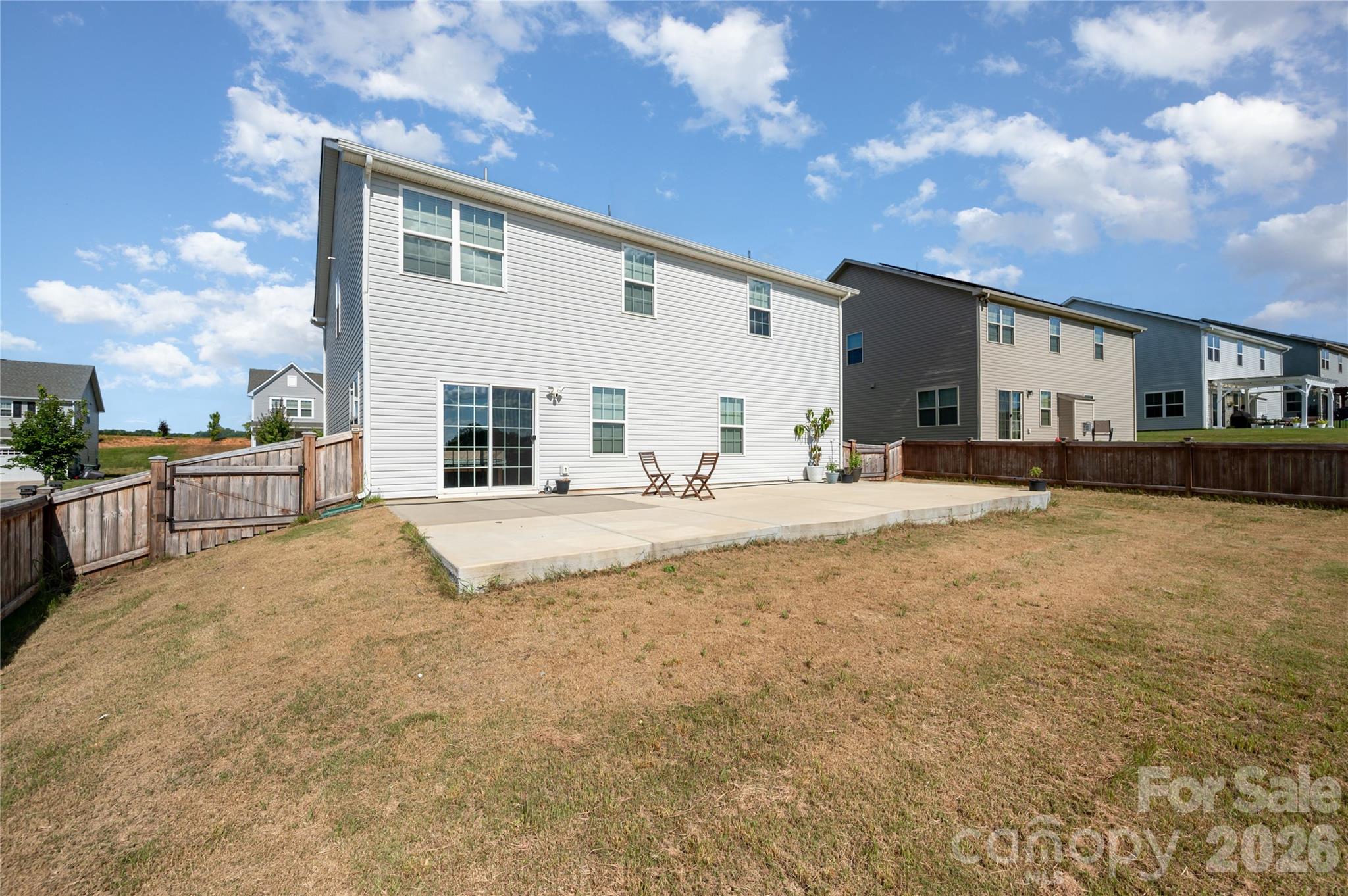 7222 Waterwheel Street Southwest Concord, NC 28025 - Photo 42 of 48 a house view with a outdoor space