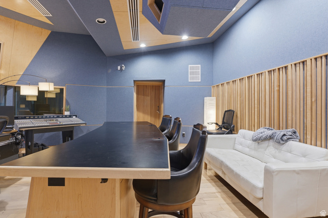 702 Alpine Highway Alpine, UT 84004 - Photo 73 of 83 Dedicated studio space featuring acoustic paneling, wood slat wall details, recessed lighting, and a solid wood door