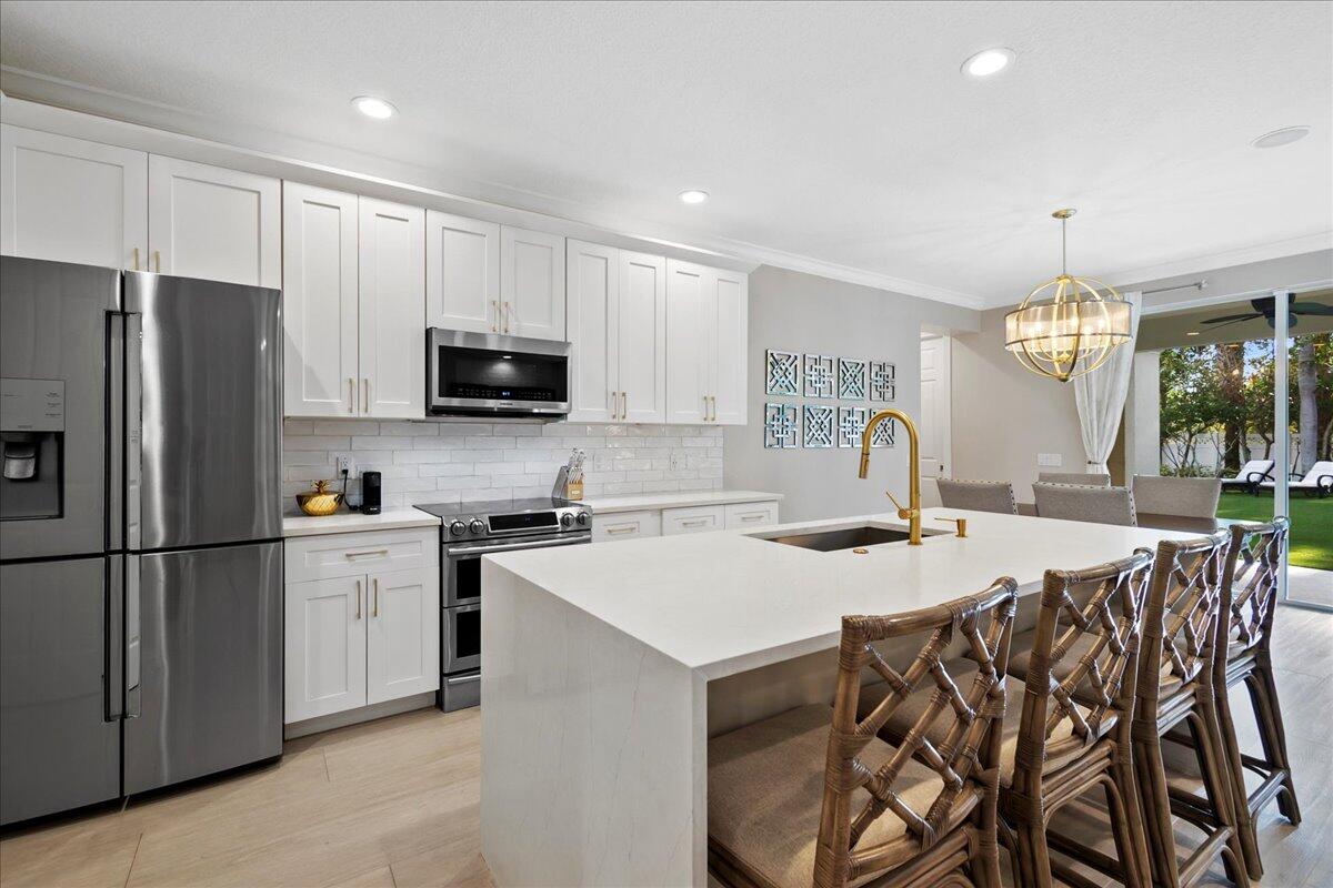 272 San Remo Drive Jupiter, FL 33458 - Photo 10 of 58 owengroupre.com