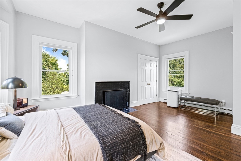 5 Babson Street, Unit 2 Gloucester, MA 01930 - Photo 10 of 23 a bedroom with a bed and a window