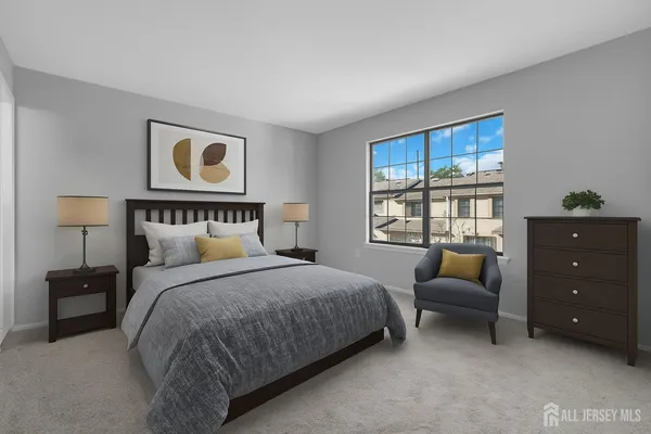 a bedroom with a bed and a couch