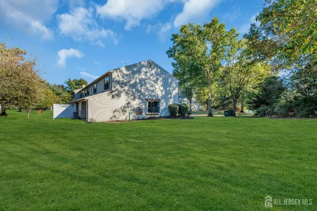 a view of a house with a big yard
