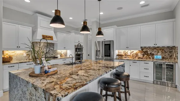 a kitchen with a stove and a sink