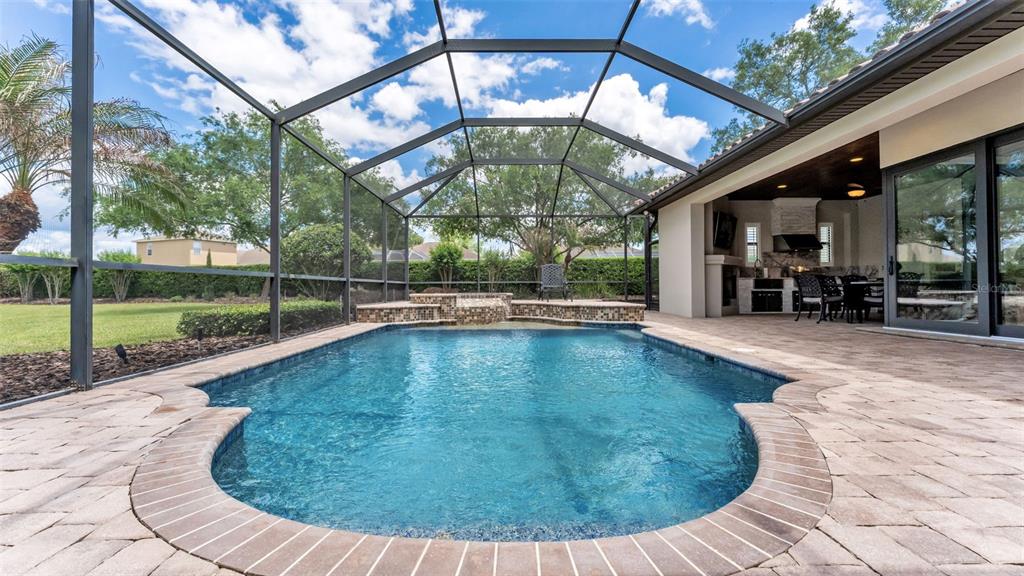 6538 Eagle View Loop Lakeland, FL 33813 - Photo 63 of 89 a view of a swimming pool with a patio