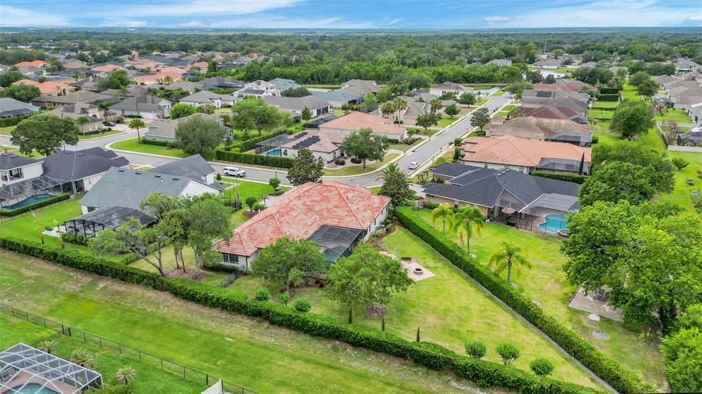 6538 Eagle View Loop Lakeland, FL 33813 - Photo 89 of 89 an aerial view of residential houses with outdoor space