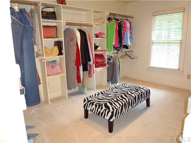 1604 Hunting Ridge Road Raleigh, NC 27615 - Photo 15 of 25 Half Of The Master Closet. Plenty of Single Hanging, Double Hanging, and Shelves To Keep You Organized In Every Season. Other