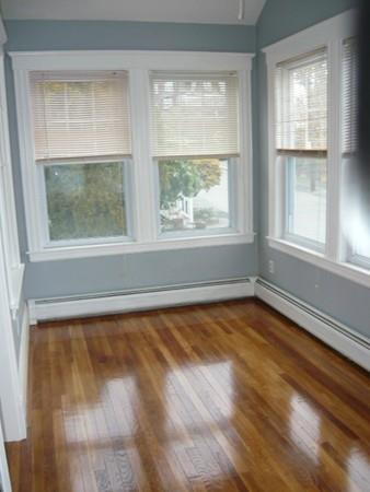 30 Pitman Road Swampscott, MA 01907 - Photo 12 of 31 an empty room with wooden floor and windows