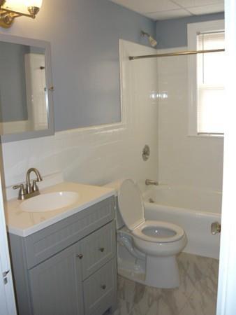 30 Pitman Road Swampscott, MA 01907 - Photo 16 of 31 a bathroom with a sink a toilet and shower