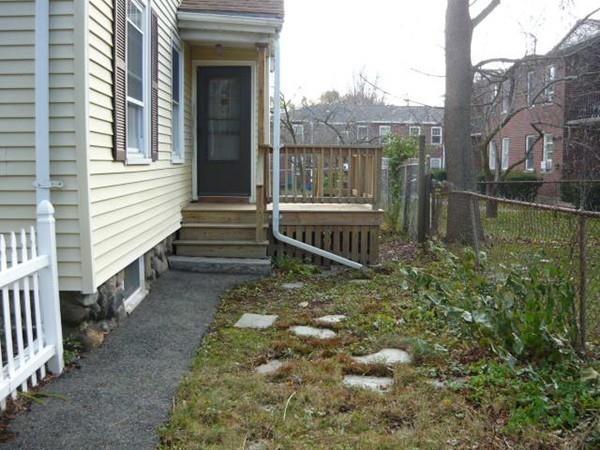 30 Pitman Road Swampscott, MA 01907 - Photo 31 of 31 a view of a house with a small yard and wooden floor and fence