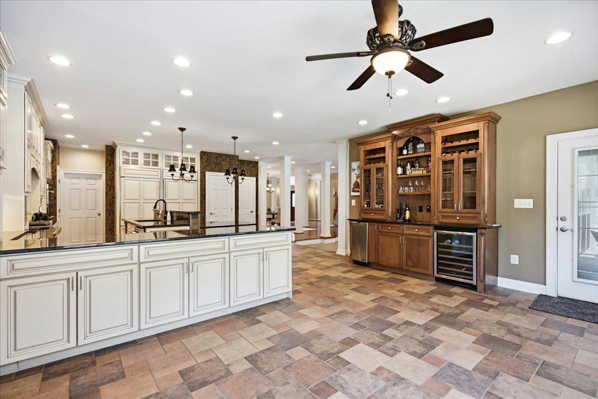 4100 Hidden Creek Road Port Republic, MD 20676 - Photo 41 of 92 The whole kitchen space, access to porch and pool