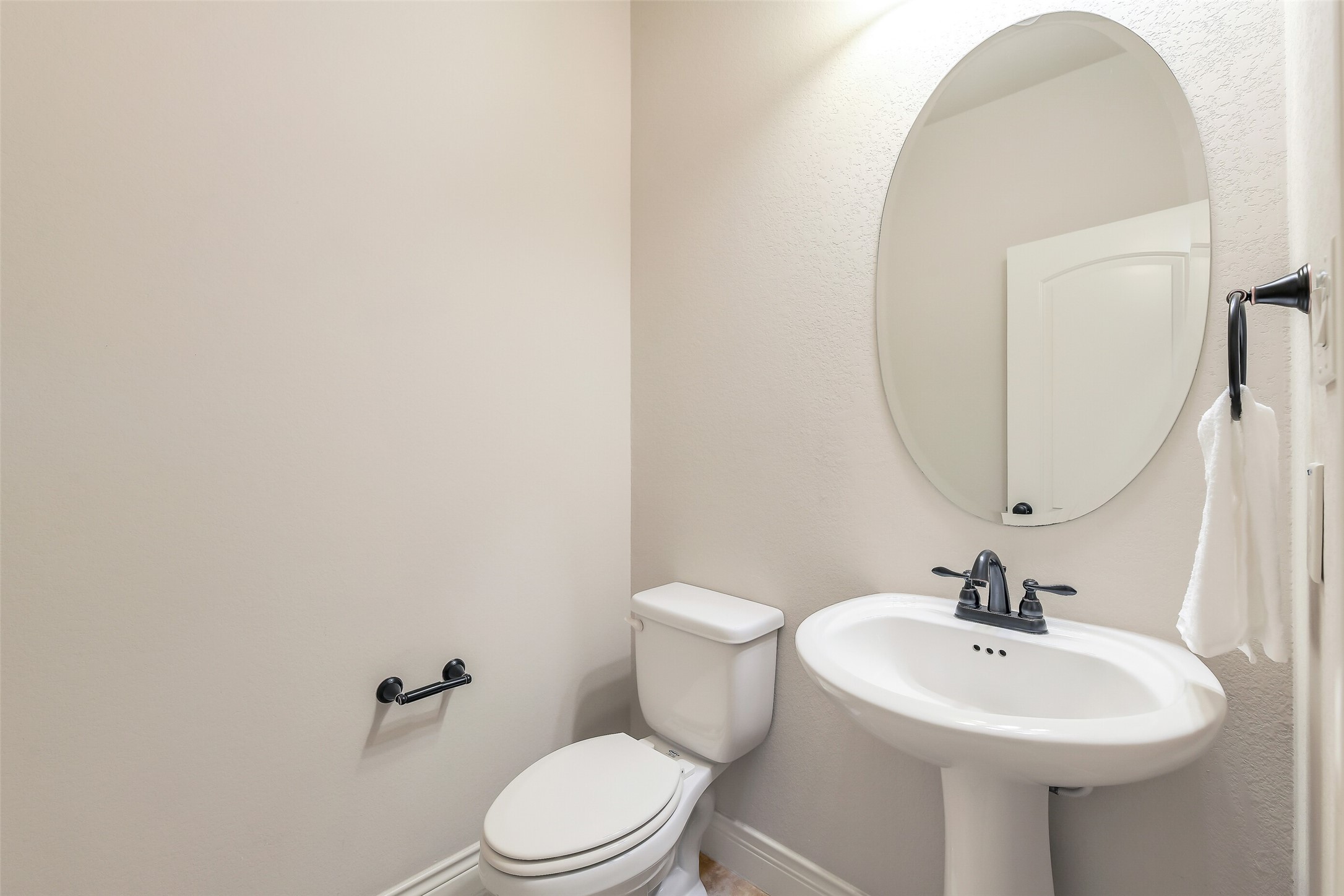 27906 Colonial Point Drive Katy, TX 77494 - Photo 18 of 39 a bathroom with a sink a toilet and mirror