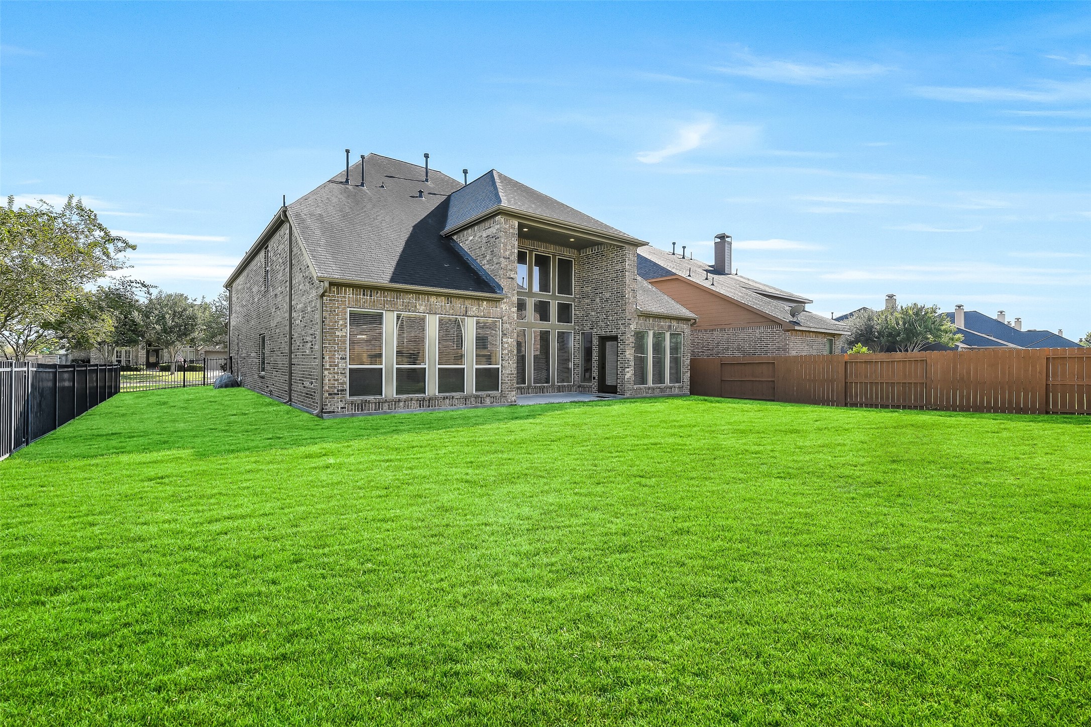 27906 Colonial Point Drive Katy, TX 77494 - Photo 38 of 39 a view of a big house with a big yard and large tree