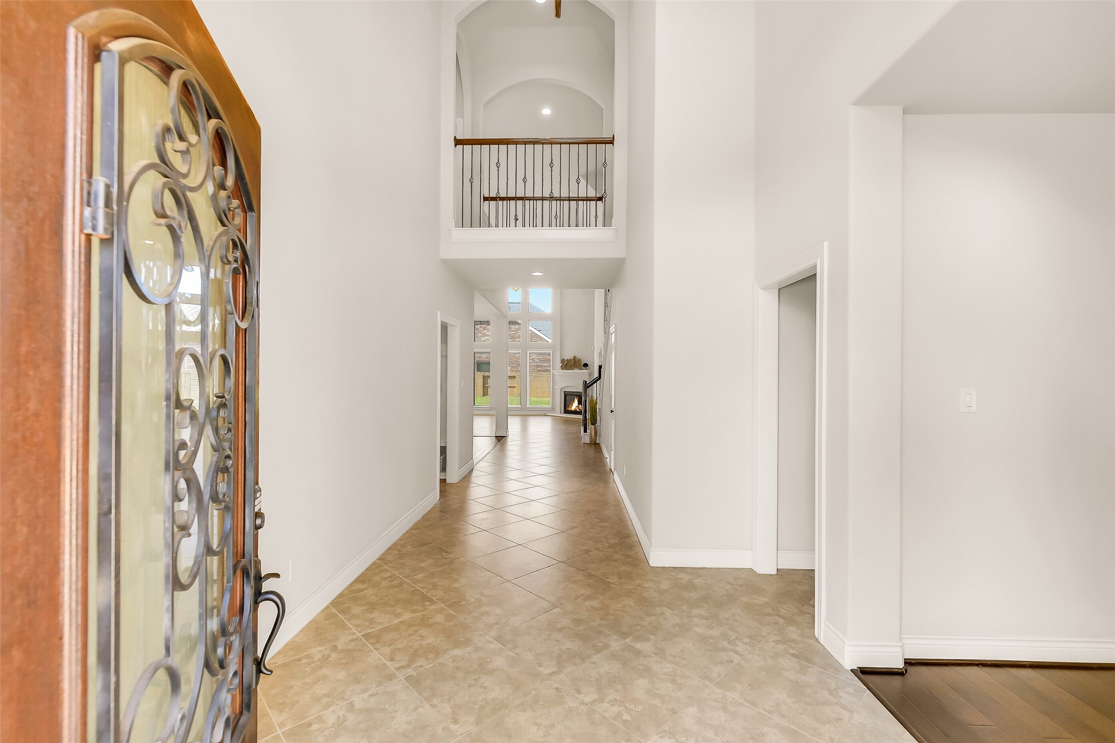 27906 Colonial Point Drive Katy, TX 77494 - Photo 4 of 39 a view of a hallway with wooden floor