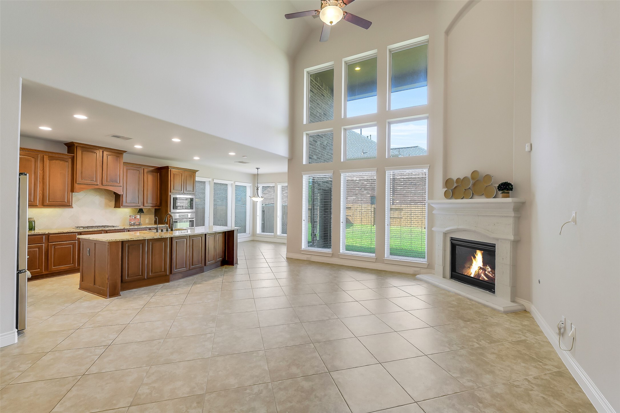 27906 Colonial Point Drive Katy, TX 77494 - Photo 39 of 39 a view of kitchen with furniture and fireplace