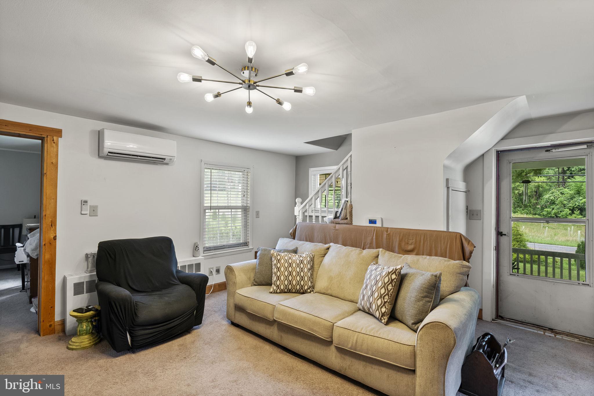12625 Harford Road Kingsville, MD 21087 - Photo 22 of 33 a living room with furniture and a large window