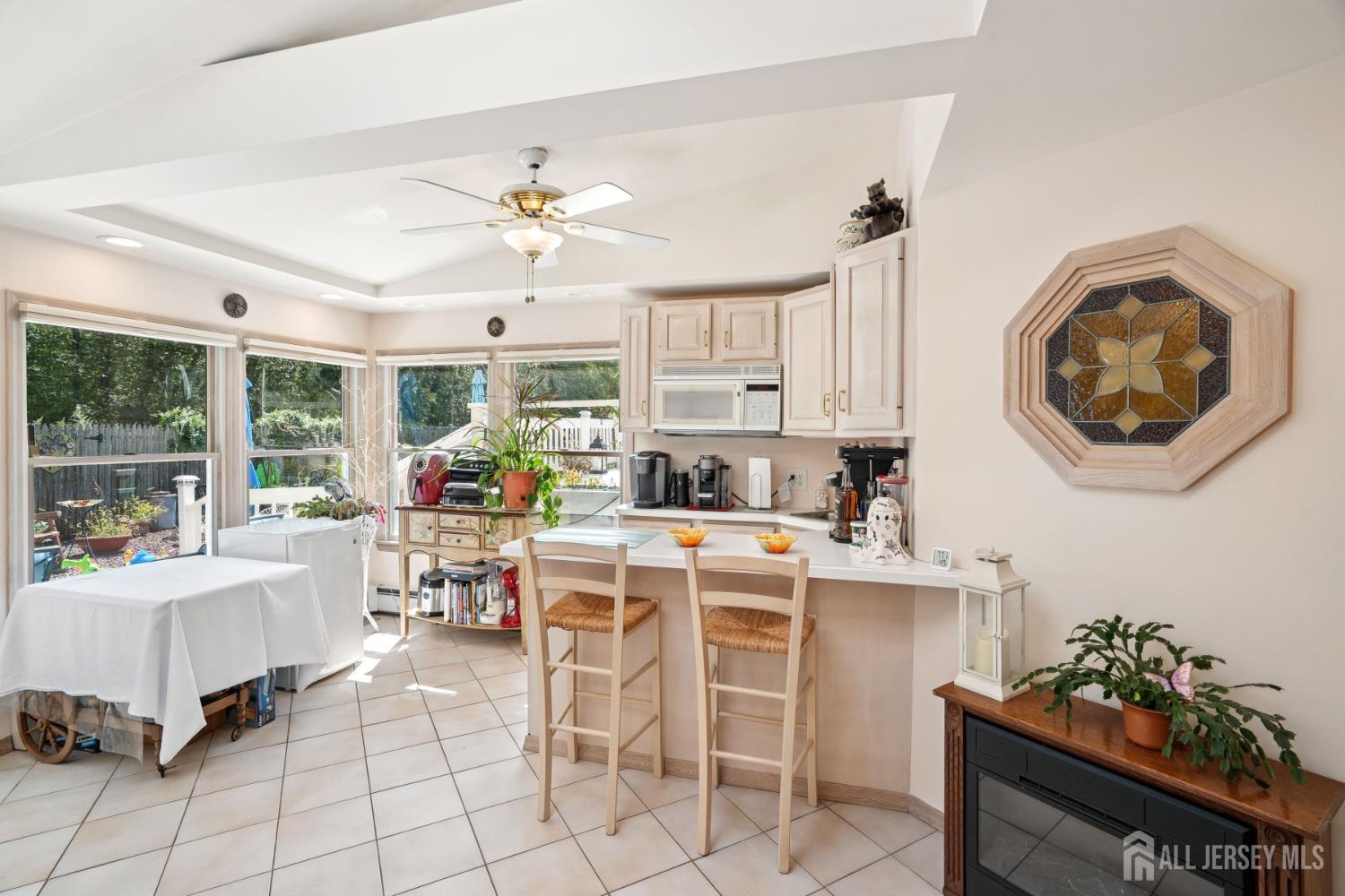 266 Amherst Avenue Colonia, NJ 07067 - Photo 15 of 22 a living room with furniture and a large window