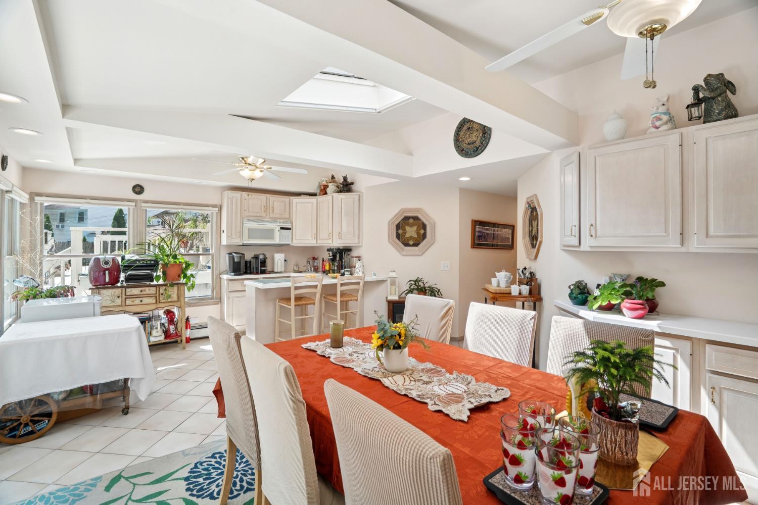 266 Amherst Avenue Colonia, NJ 07067 - Photo 17 of 22 a living room with furniture and flowers