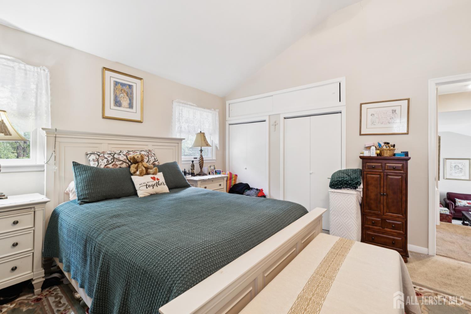 266 Amherst Avenue Colonia, NJ 07067 - Photo 9 of 22 a bedroom with a bed and a walk in closet